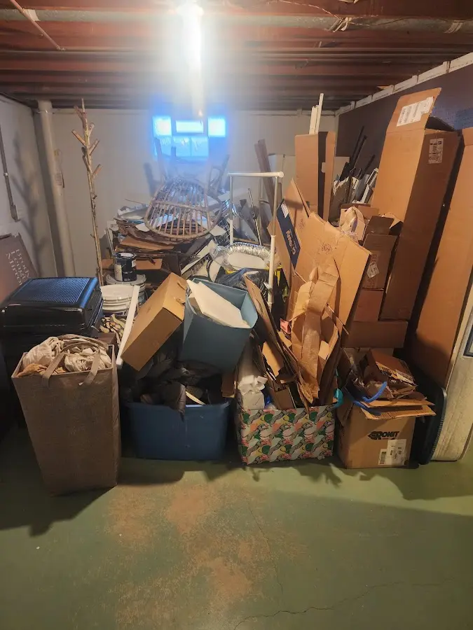 Roll-off dumpster container at job site for 2 Yard Dumpster Rental in North Merritt Island